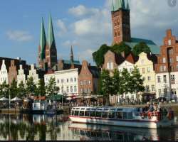 The town is located along the Trave and Wakenitz r The town is located along the Trave and Wakenitz rivers and is just nine miles away from the Baltic Sea that's why it became an important center of tr